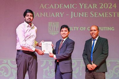 Receiving Dean's List award